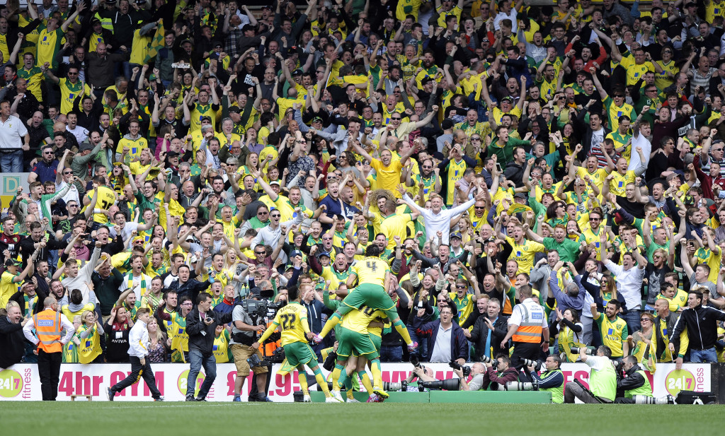 Norwich celebrate their opening goal with the fans