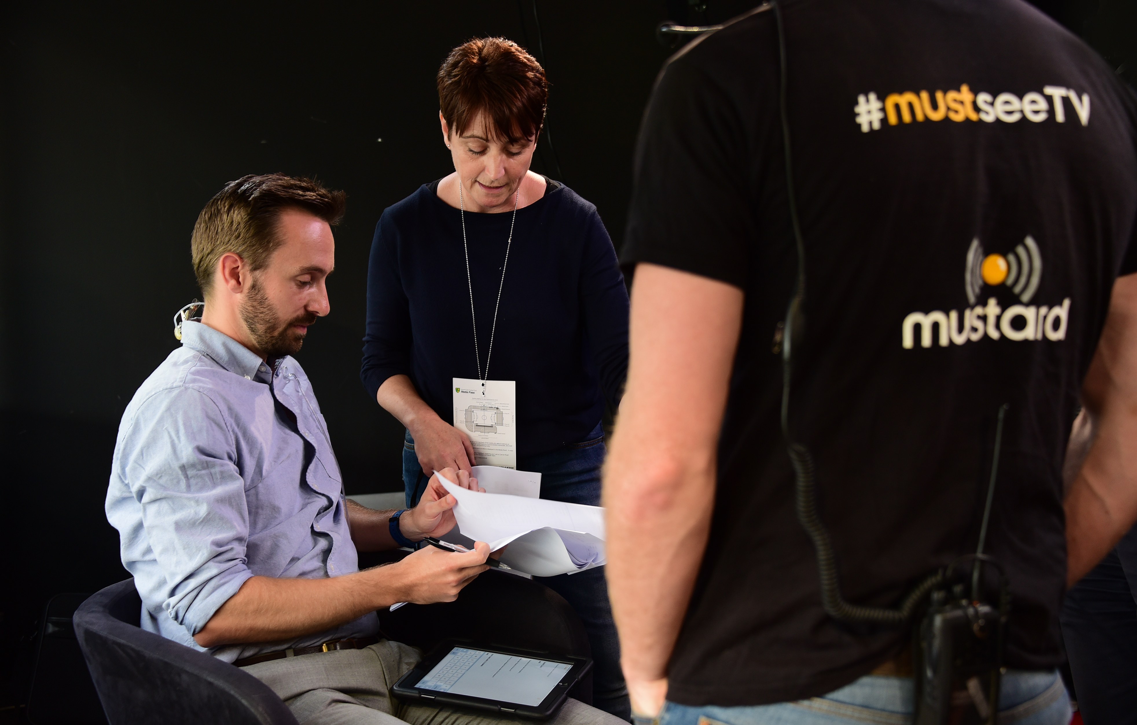 Preparations under way for Mustard TV's live broadcast of the Norwich City friendly match against West Ham at Carrow Road. Michael Bailey in the studio with gallery producer Jo Drewry. Picture: DENISE BRADLEY